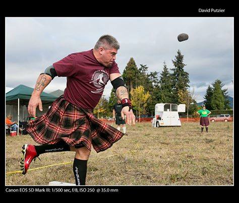 Guys in kilts compete in heavy athletics